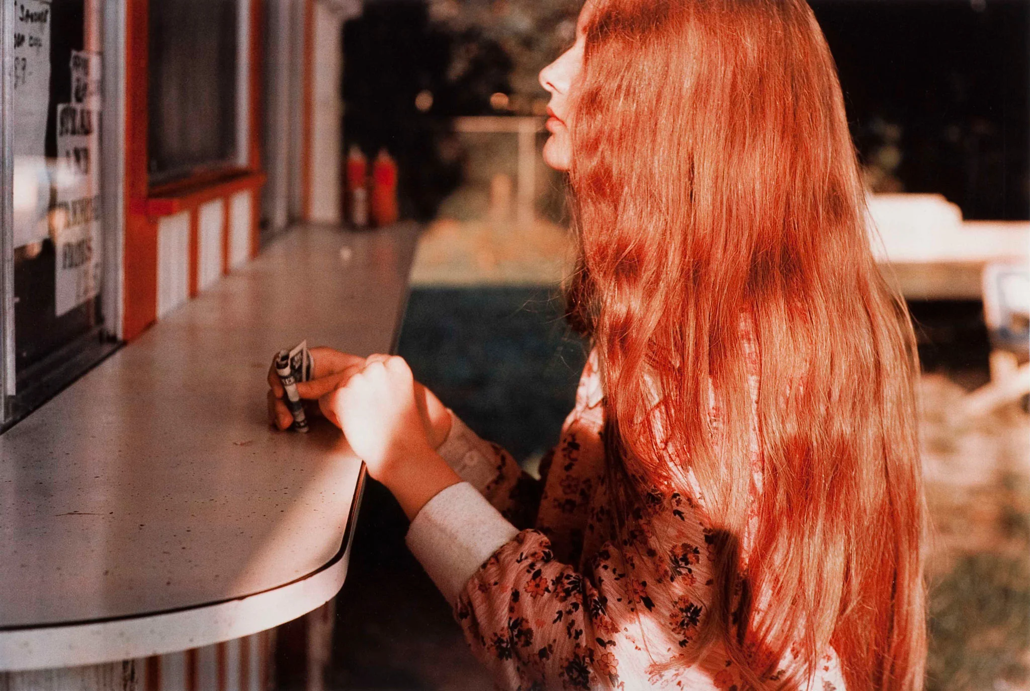 Untitled Girl with Red Hair photograph by William Eggleston, 1974